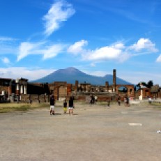 The ruined city of Pompeii, under the shadow of Mount Vesuvius